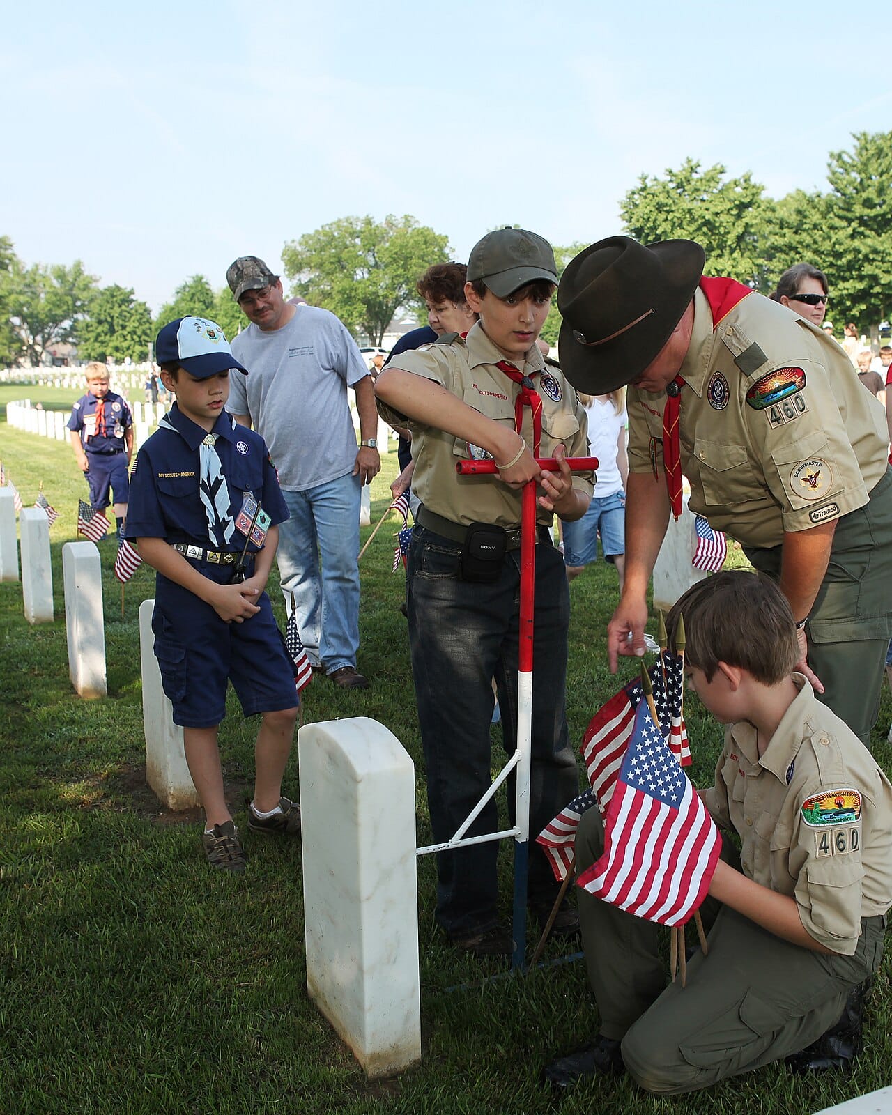FEMA - 44471 - Boy Scouts place flags at Nashville National Memorial Cemetery