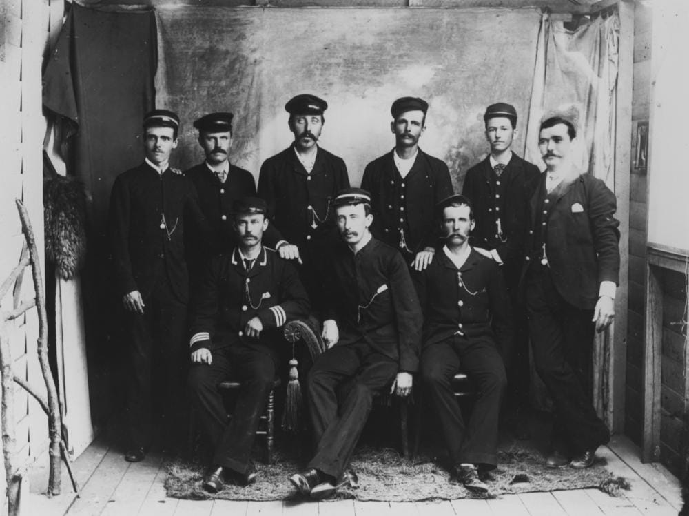 Staff of the Cairns railway station, Queensland, 1890s.