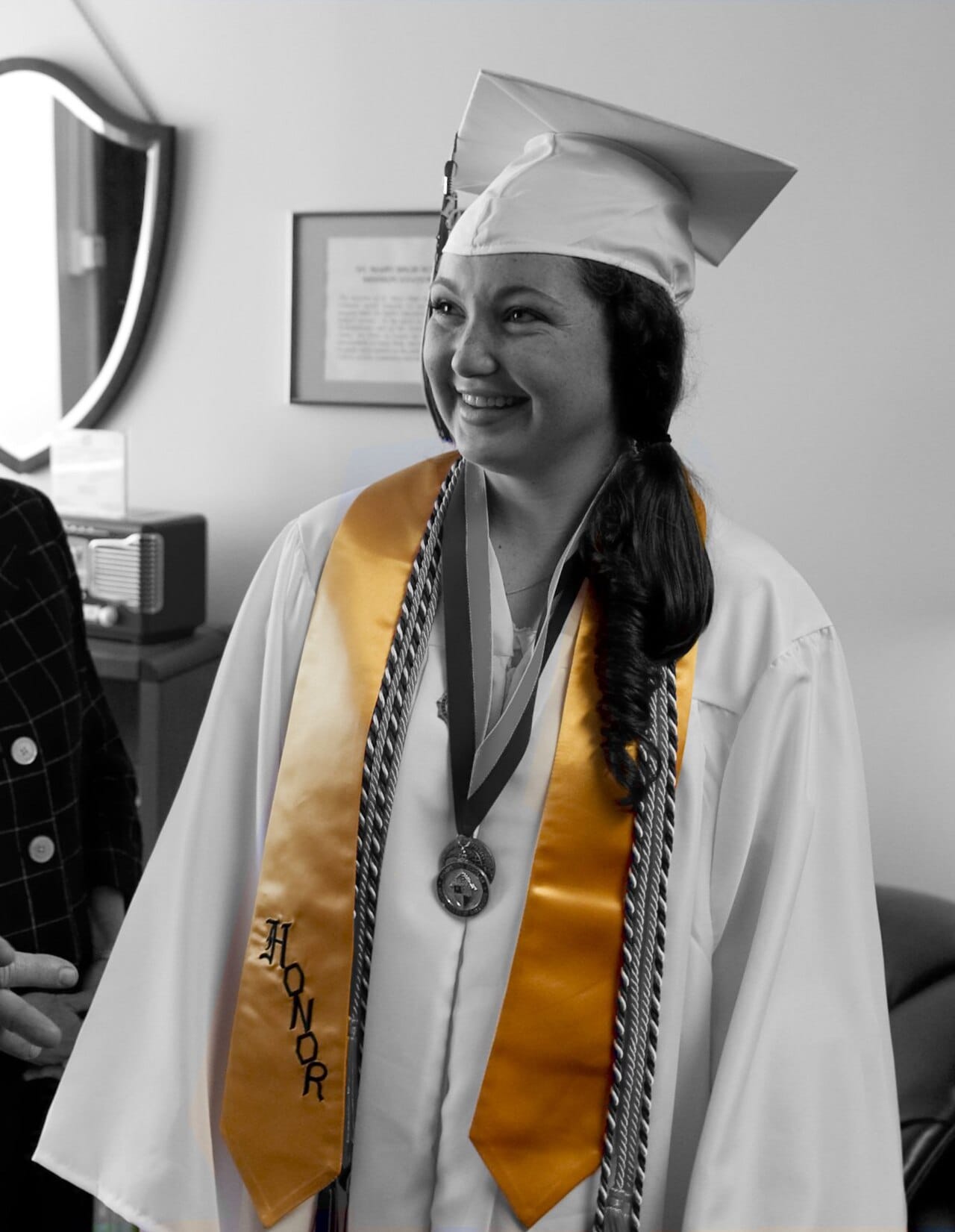 An academic stole, worn over the shoulders in place of a hood.