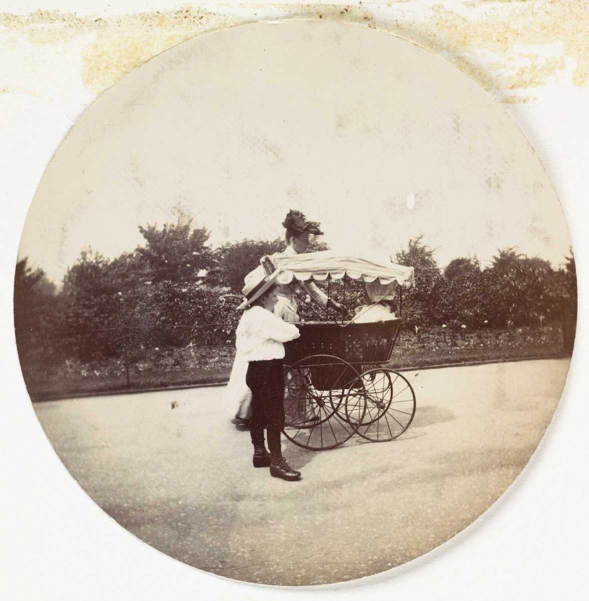 Woman, boy and a pram (2780164703)