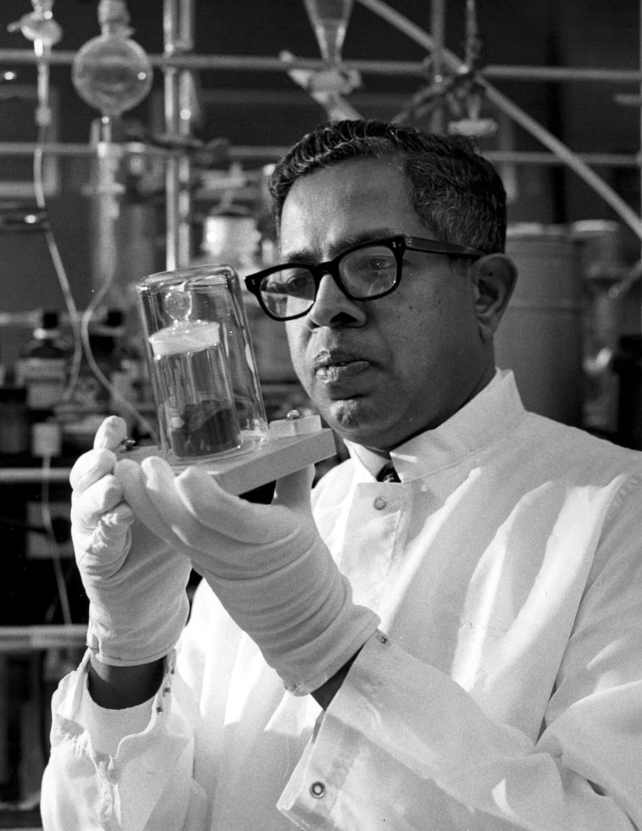 A chemist examining a lunar sample.