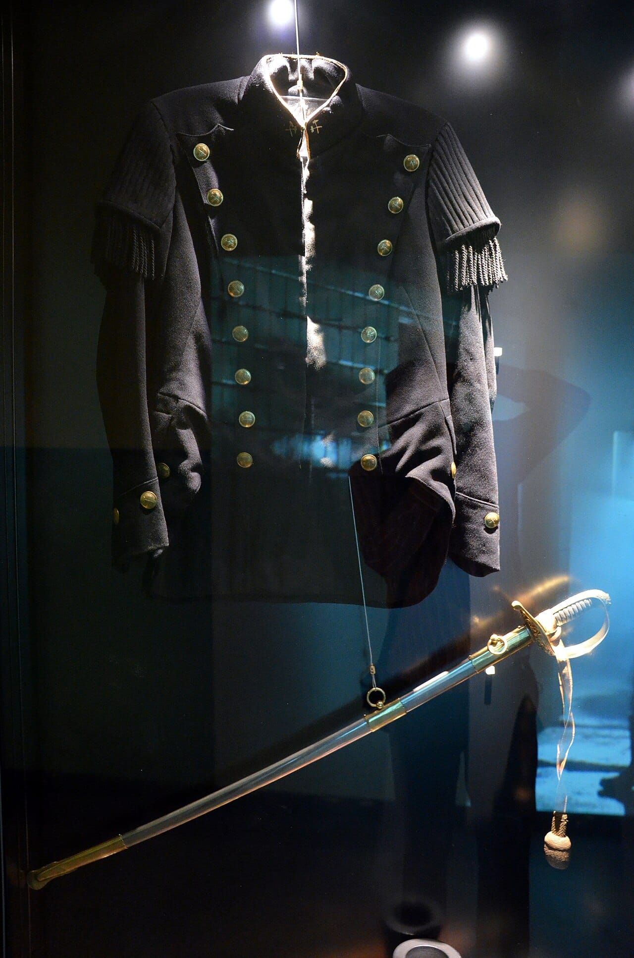 A tunic in a Silesian museum case.