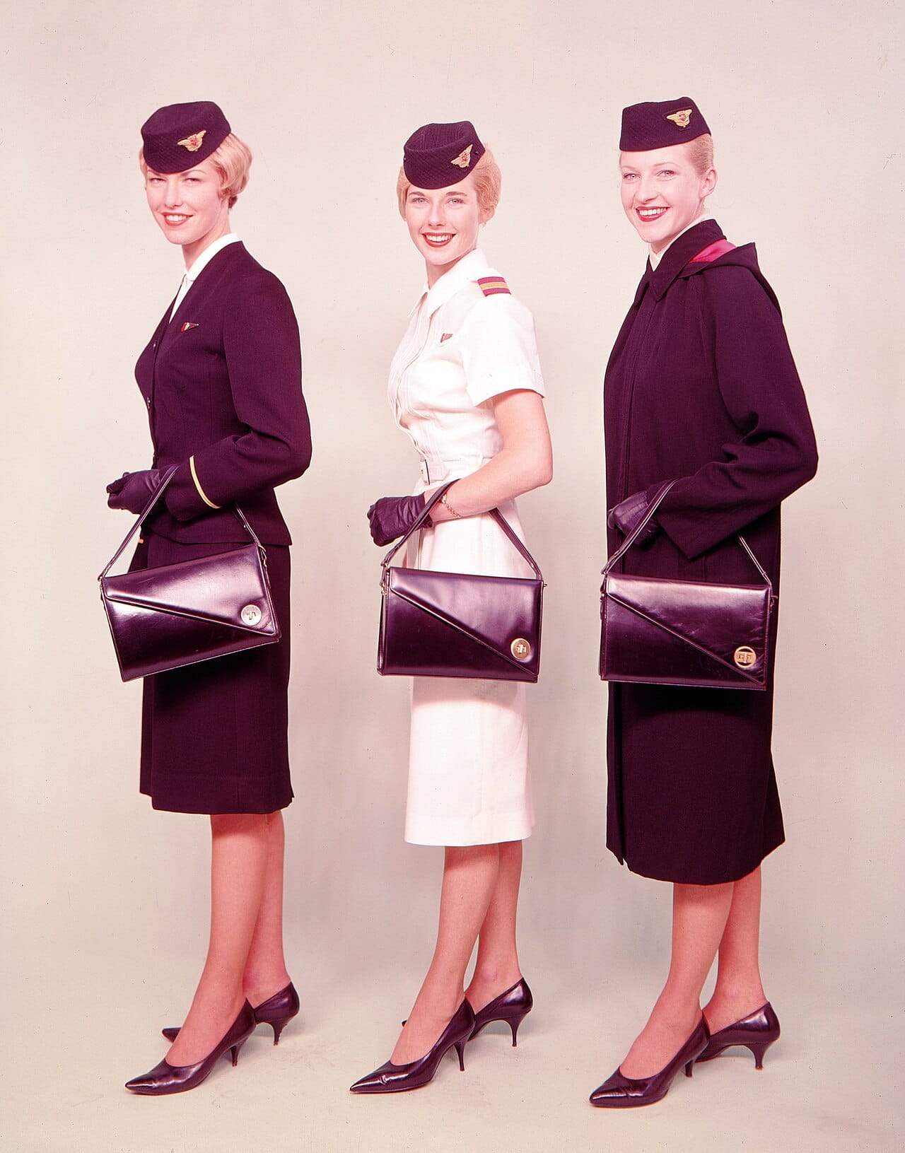 Summer and winter uniforms of the same year, shown together.