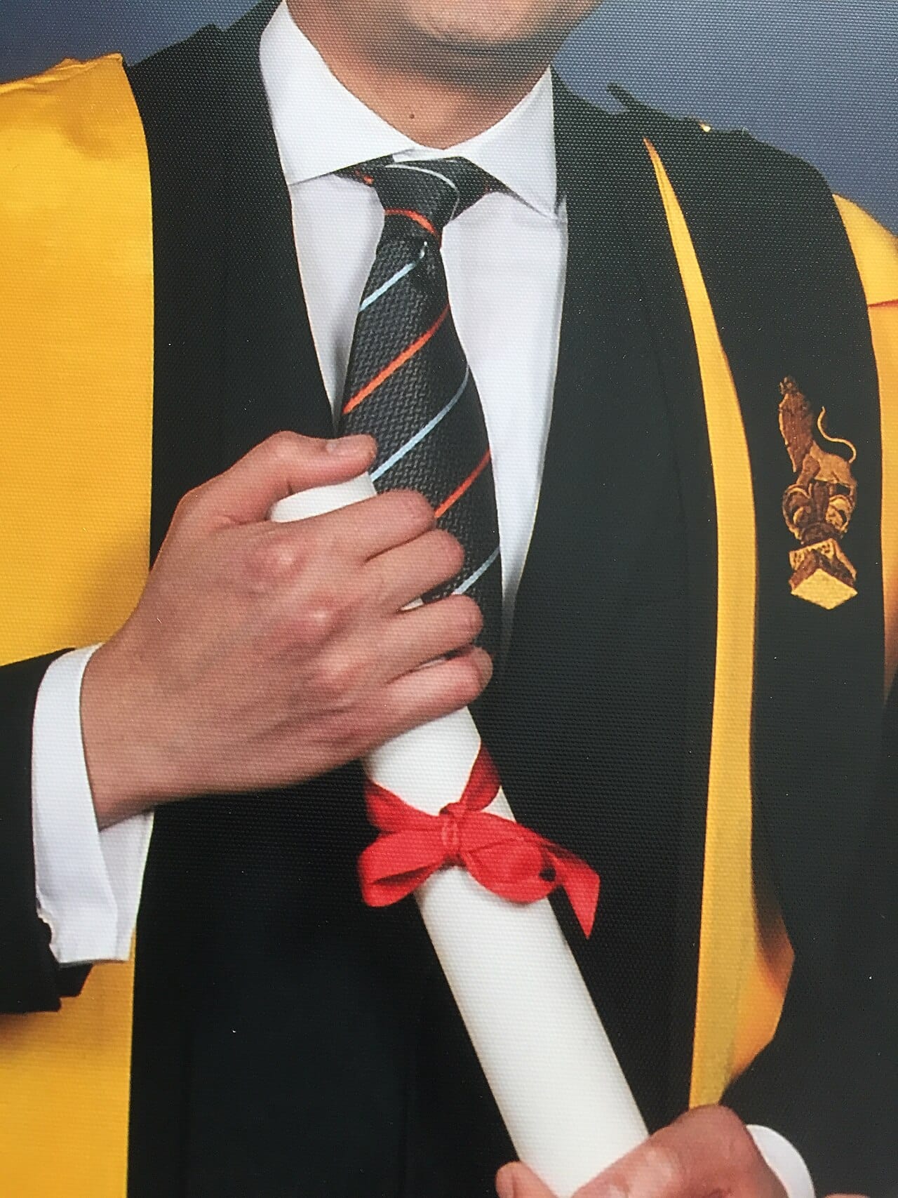 A KCL hood with the epitoge of the Associateship of King's College.