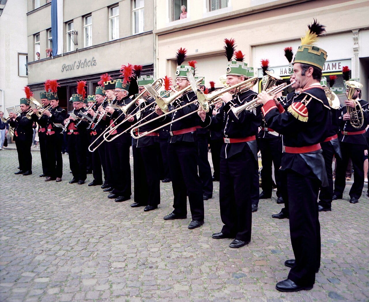 A miners' band in black with red facings.