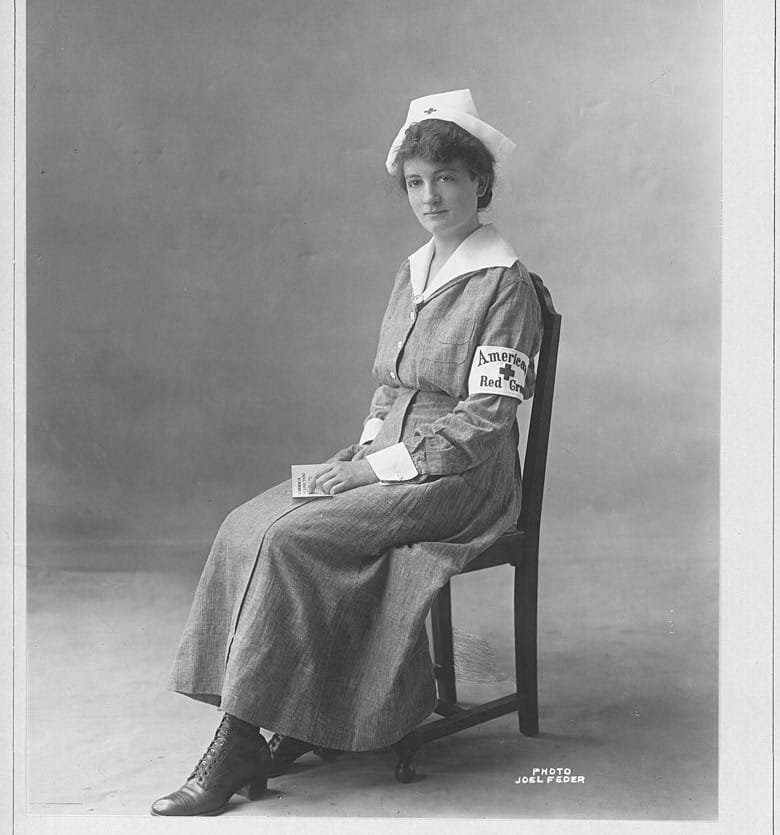 American Red Cross instructional photograph of the indoor nurses' uniform.