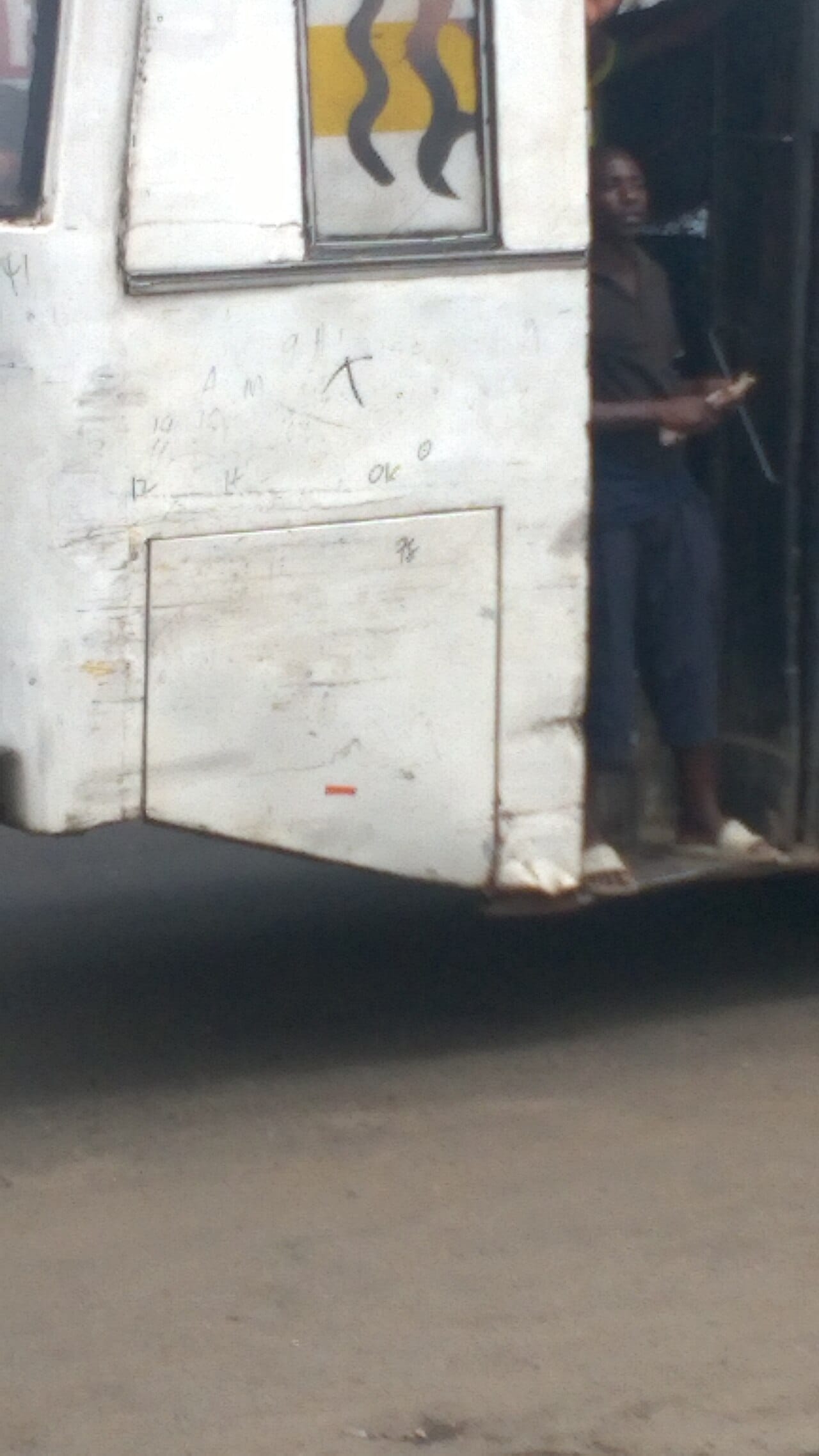 Bus conductor at work