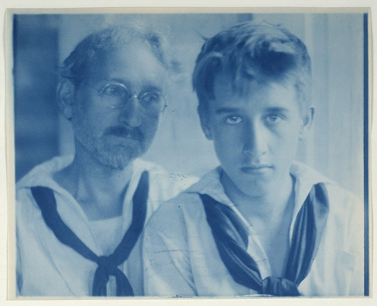 Two boys photographed in sailor suits.