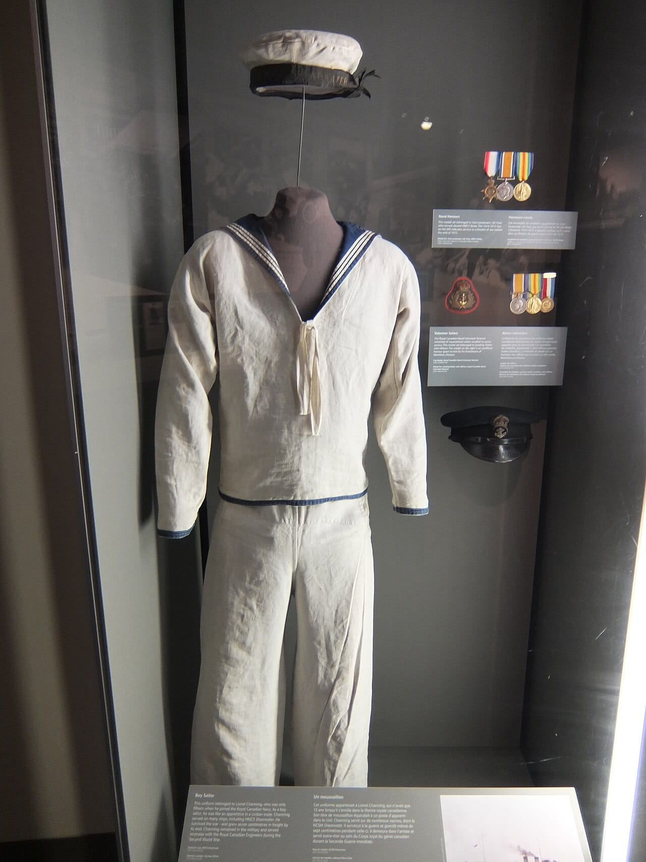 A display captioned "Boy Sailor", showing an early naval rig.