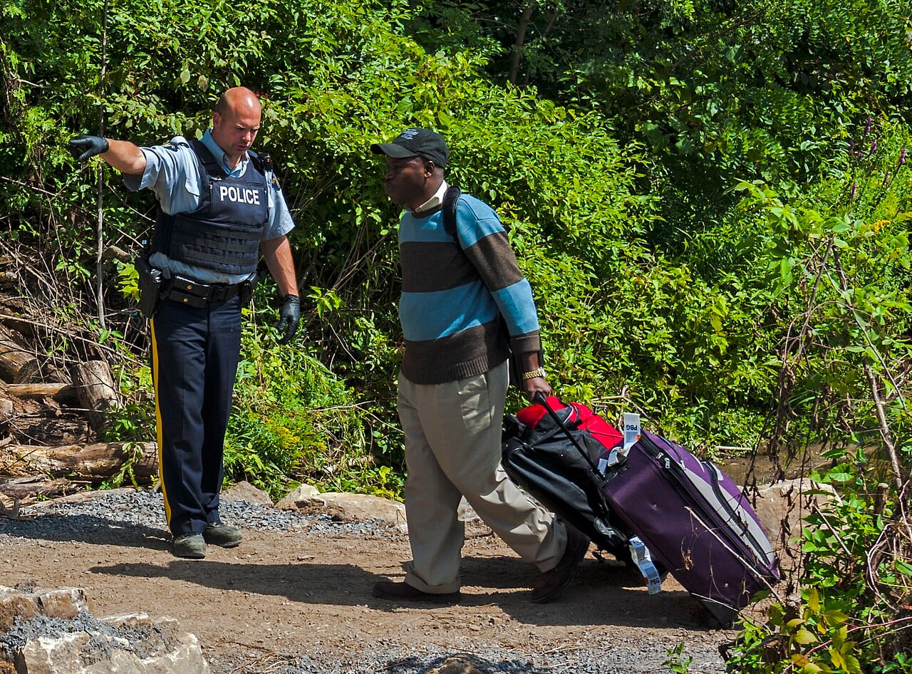 Asylum seeker entering Canada from Roxham Road, Champlain, NY