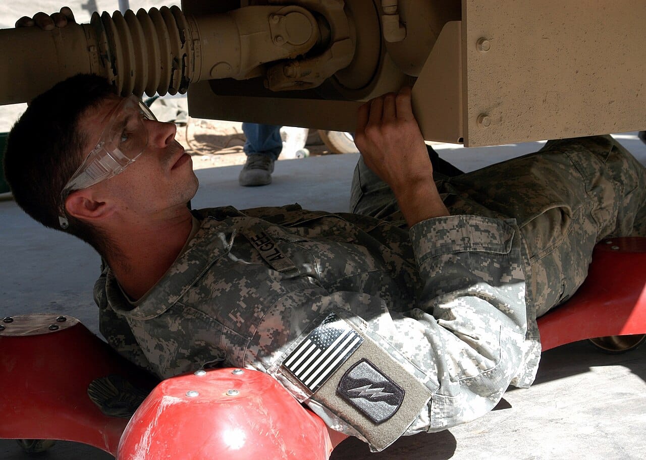 US Army 52574 Spc. Robert J. Algee, a mechanic from Senatobia, Miss., checks for leaks and other deficiencies during a quality assurance and quality check of an MRAP Sept. 30. Algee serves with B Company, 2nd Batt