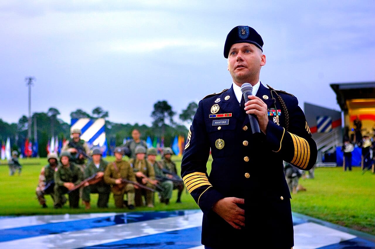 A ceremonial military review, full dress with braid, cord and contrasting facings.