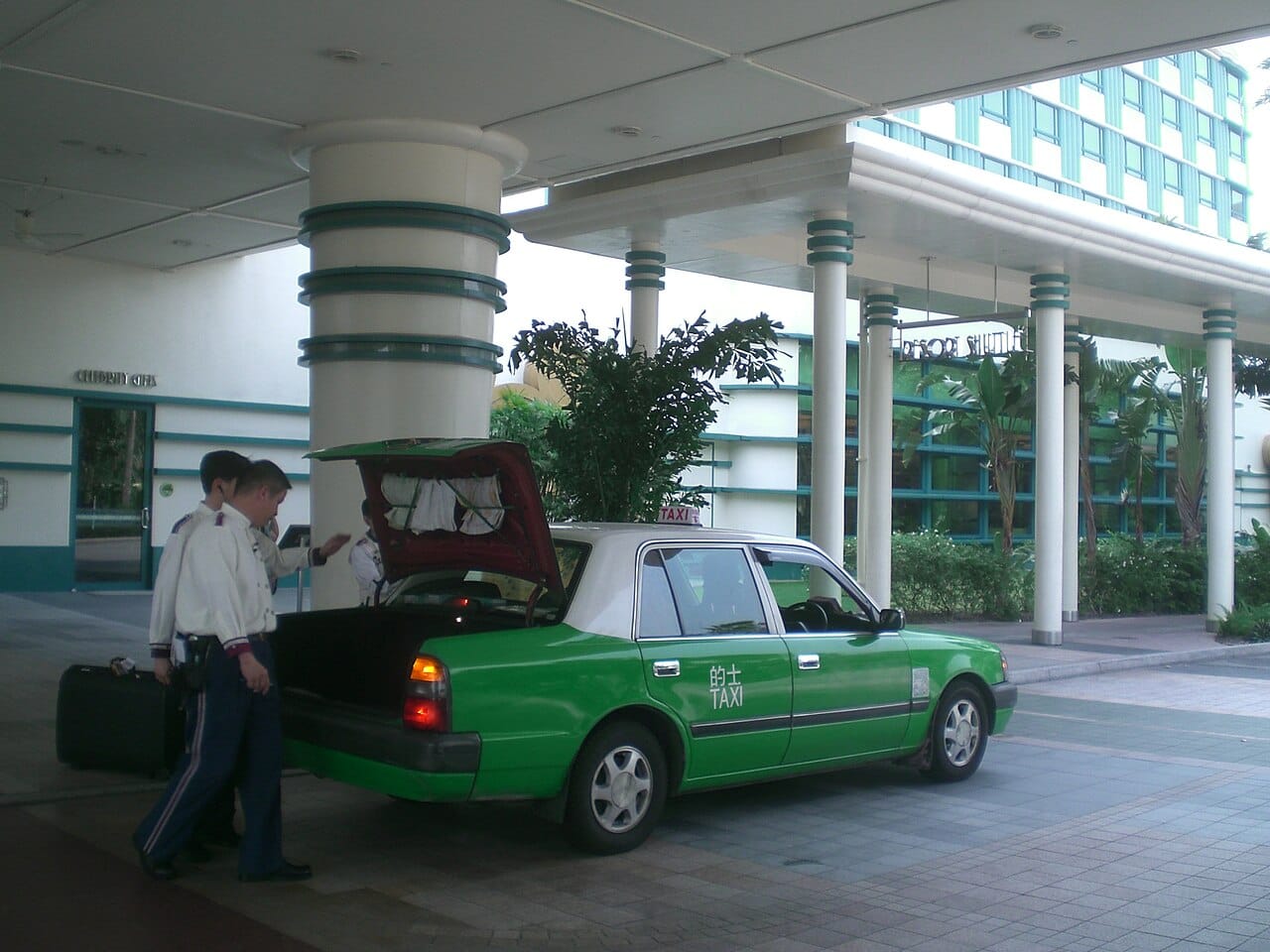 HK Disney's Hollywood Hotel Bellboy porter n Green Taxi