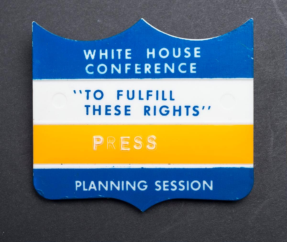 The same badge, photographed square on.
