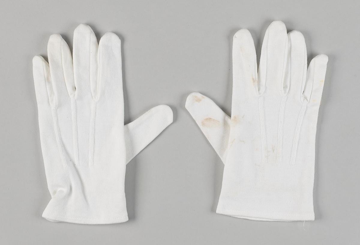 A pair of uniform gloves.