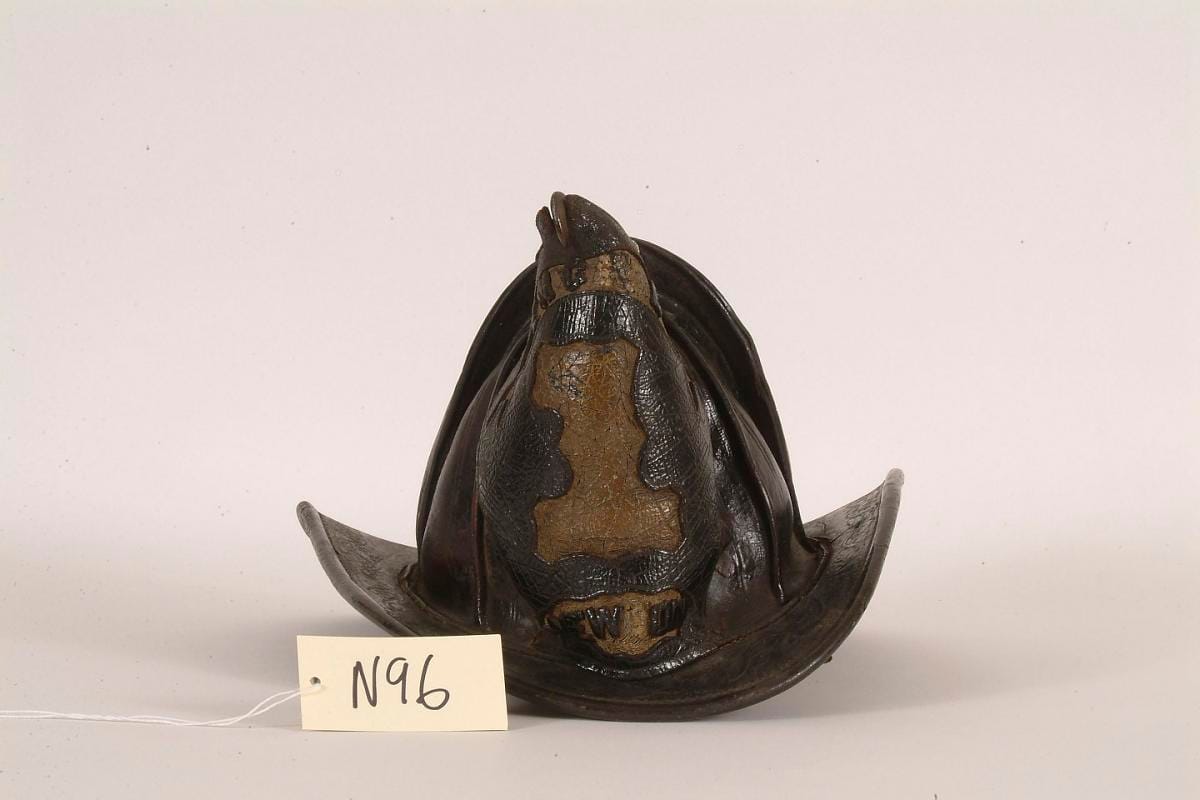 A helmet carrying the word "Engineer" above a company name.