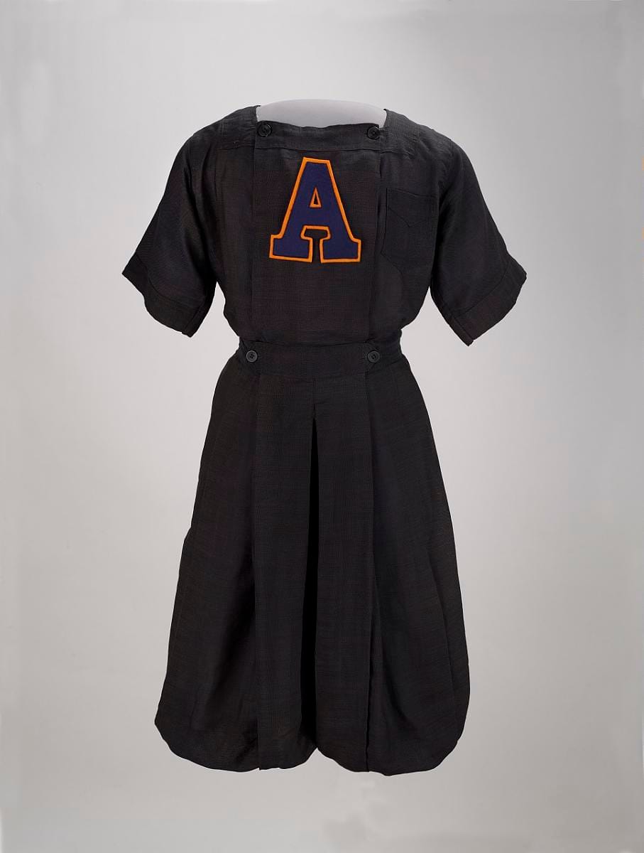 A school gym suit: a one-piece garment with elasticated legs and a front closure.