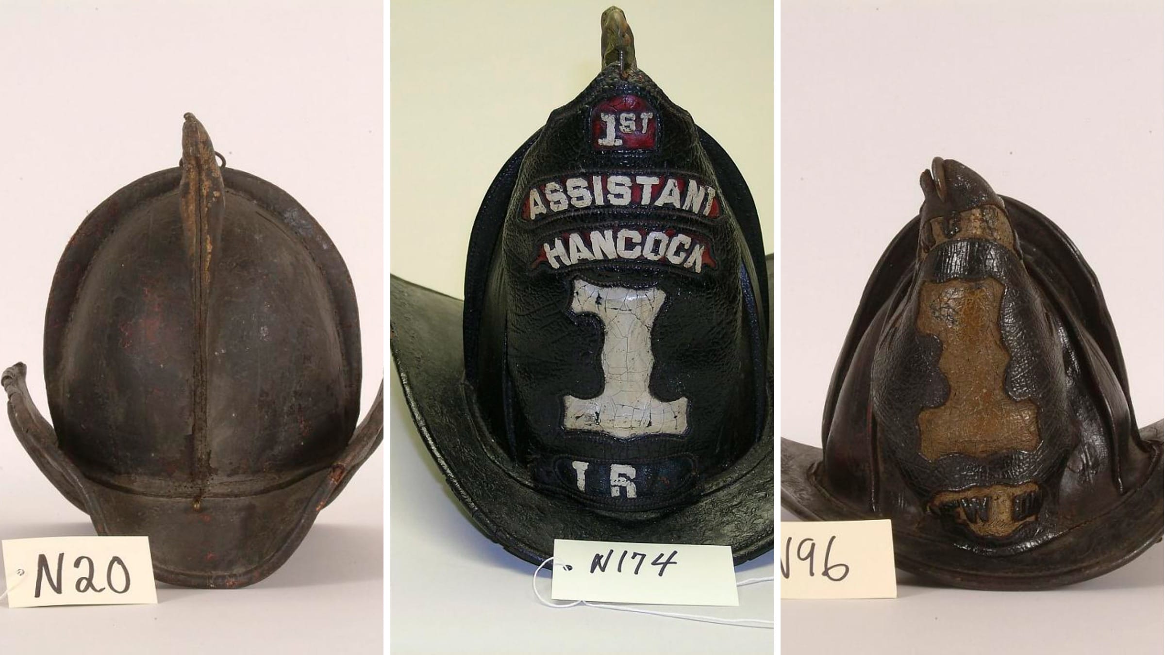 Three nineteenth-century American leather fire helmets from different companies